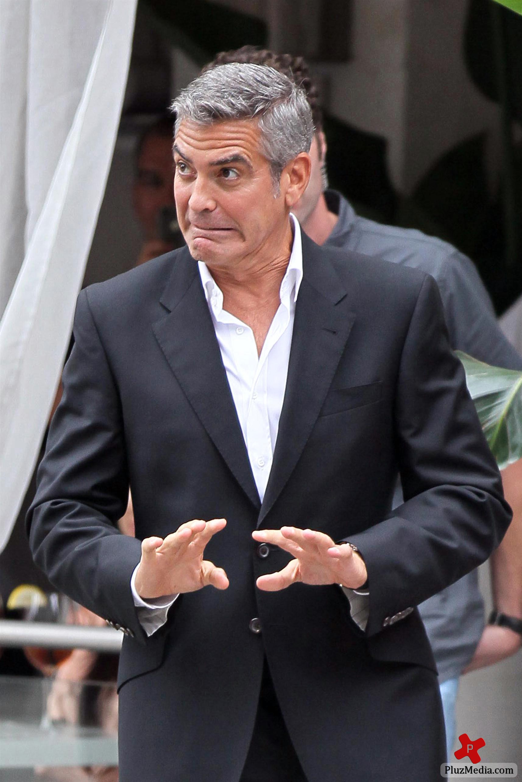 George Clooney on the set of a Mercedes Benz E300 L advert photos | Picture 78295